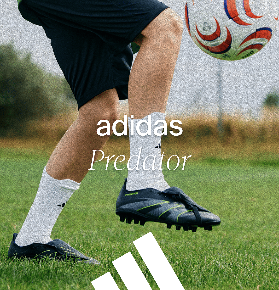 Legs in black shorts, white socks, and Adidas Predator cleats juggling a soccer ball on a field. Text: adidas Predator.