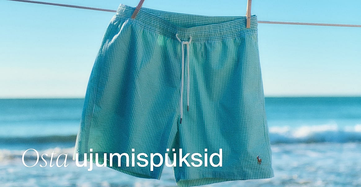 Sinakasrohelised triibulised ujumispüksid ripuvad pesunööril, päikeselise ranna ja ookeani taustal.
Tekst: Osta ujumispükse.