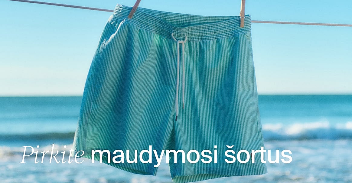 Turkio spalvos dryžuoti maudymosi šortai kabo ant skalbinių virvės, o fone – saulėtas paplūdimys ir vandenynas.
Pirkite maudymosi šortus.