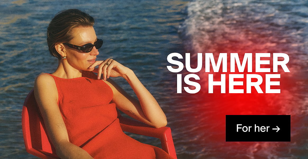 Woman in red dress and sunglasses, hand to chin, by blue water. "SUMMER IS HERE" and "For her →" text.