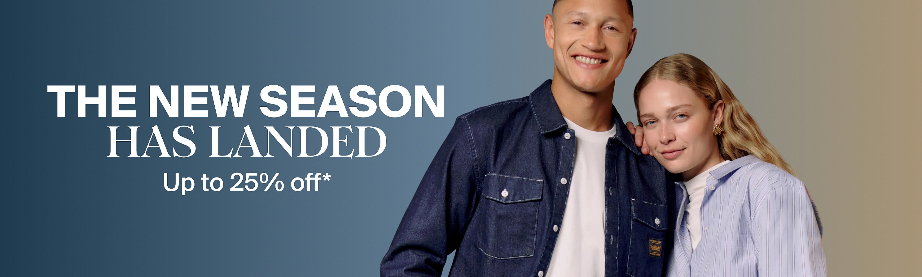Smiling man in denim shirt and woman in striped shirt. Text: "THE NEW SEASON HAS LANDED Up to 25% off*".