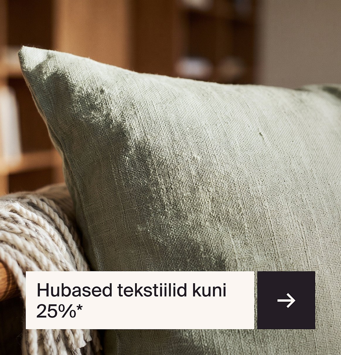 Hele roheline tekstuuriga padi toolil tekiga. Tekst: Hubased tekstiilid kuni 25% soodsamalt*.